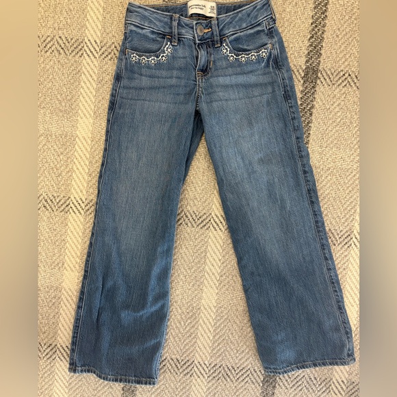 abercrombie kids Other - Abercrombie Girls low rise baggy jeans. With flower detail on pockets.